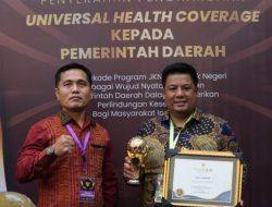 Bupati Samosir Terima Penghargaan UHC Tingkat Utama Capai Peserta Program JKN 99,35%