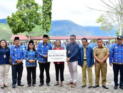 Pemkab Samosir Peringati HKN, Dirangkai Penyerahan Santunan Jaminan Kematian BPJS Ketenagakerjaan