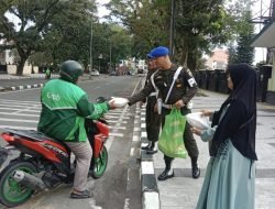 Awali Tahun Baru dengan Berkah: Dandenpom I/5 Medan dan Ketua Persit KCK Bagikan Kebahagiaan