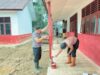 Brimob Polda Sumut Renovasi SDN 153065 Desa Lopian Tapteng