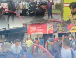 Brimob Polda Sumut Bantu Padamkan Kebakaran di Siantar