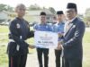 Pemkab Samosir Peringati Haornas ke-43, Wabup Ariston Serahkan Tali Asih ke 104 Atlet dan Pelatih Berprestasi