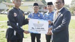 Pemkab Samosir Peringati Haornas ke-43, Wabup Ariston Serahkan Tali Asih ke 104 Atlet dan Pelatih Berprestasi